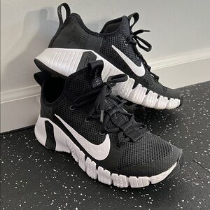 Nike Black Mesh Athletic Shoes with White Accents